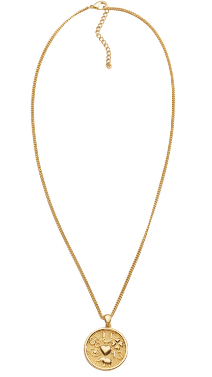 Gold necklace with a round pendant on a white background