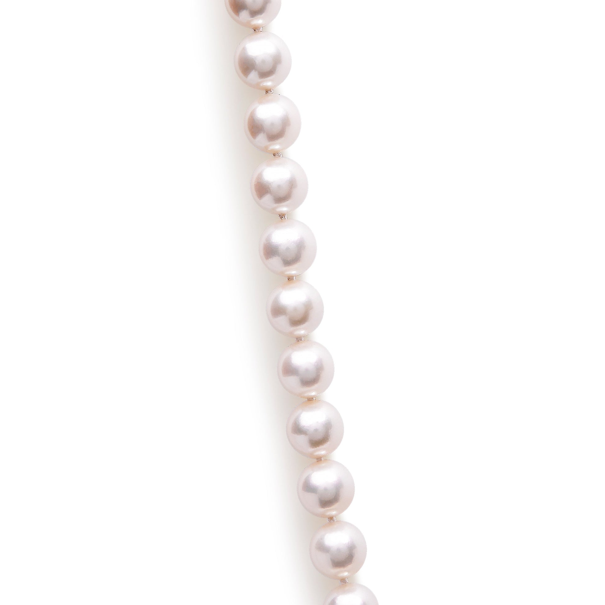 14K yellow gold strand necklace featuring 8.0x8.5mm Akoya pearls in a symmetrical arrangement.