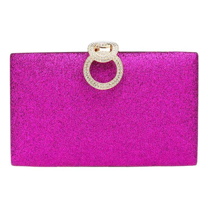 Purple clutch bag with a decorative ring on a white background