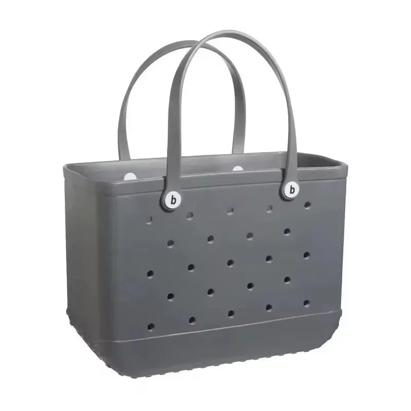 Gray tote bag with perforated design and brand logo on a white background