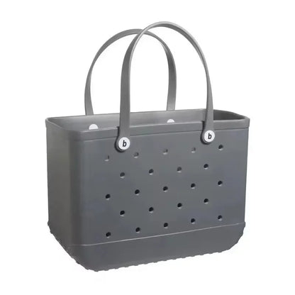 Gray tote bag with perforated design and brand logo on a white background