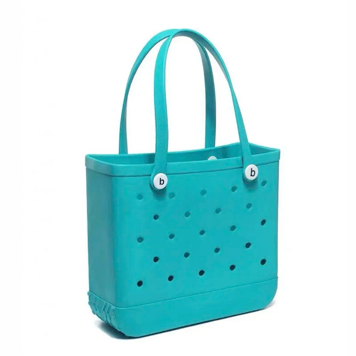 Turquoise tote bag with black dot pattern on a white background