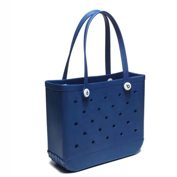Blue tote bag with perforated design and brand logo on a white background