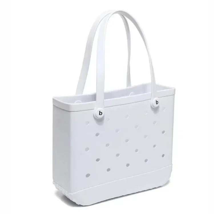 White tote bag with gray polka dots on a white background