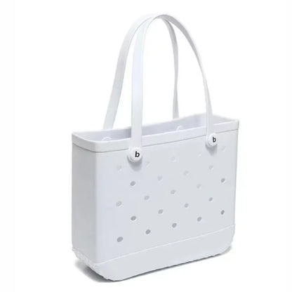White tote bag with gray polka dots on a white background