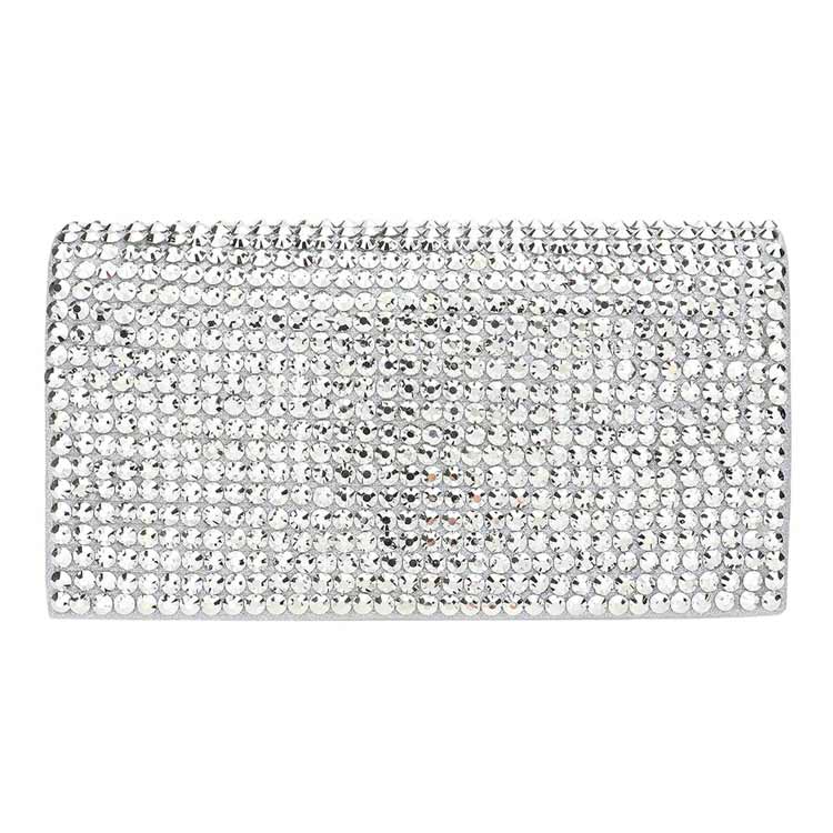 Silver clutch bag with rhinestone embellishments on a white background