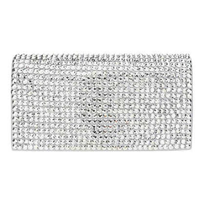 Silver clutch bag with rhinestone embellishments on a white background