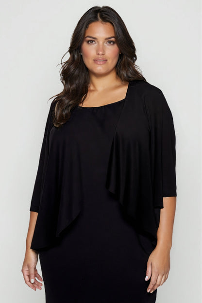 Woman wearing a black dress against a white background