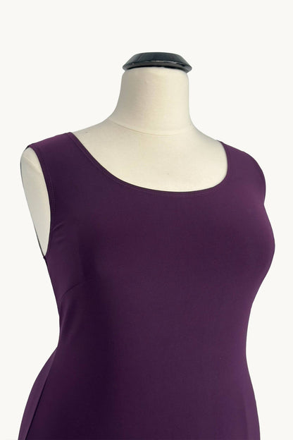 Purple sleeveless dress on a mannequin against a white background