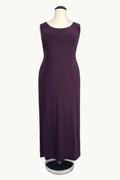 Purple dress on a mannequin against a white background