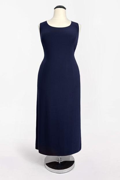 Navy blue dress on a mannequin against a white background