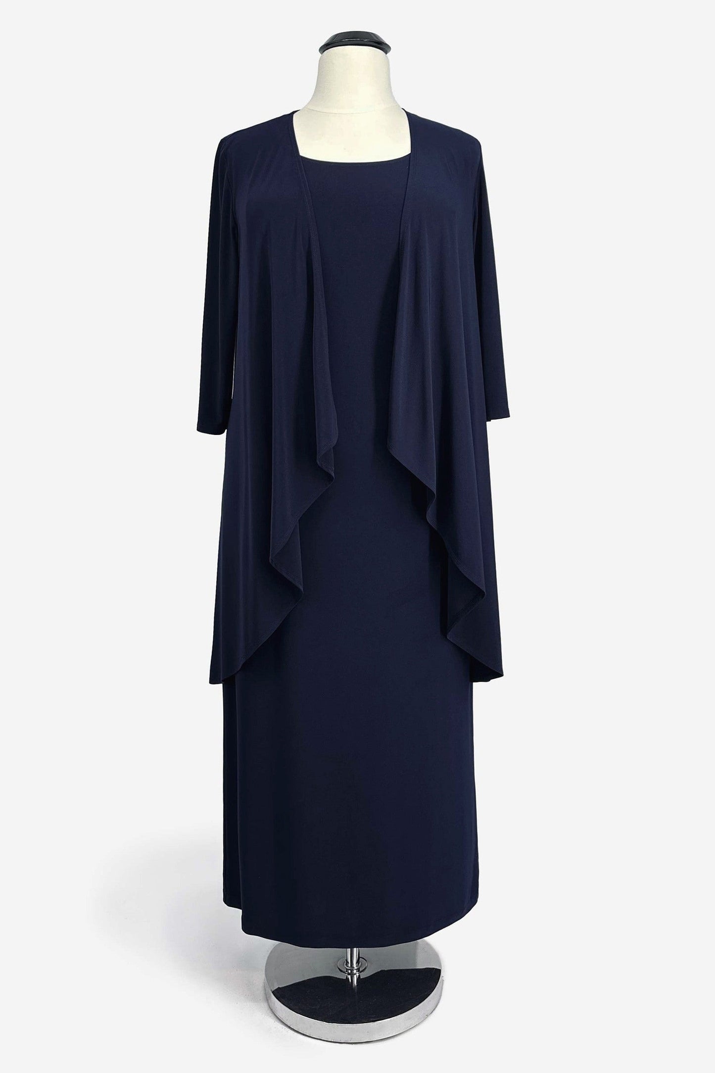 Navy blue dress with a matching jacket on a mannequin against a white background