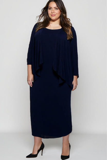 Woman wearing a navy blue dress against a white background