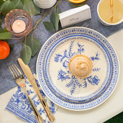 Table setting featuring french toile paper napkin