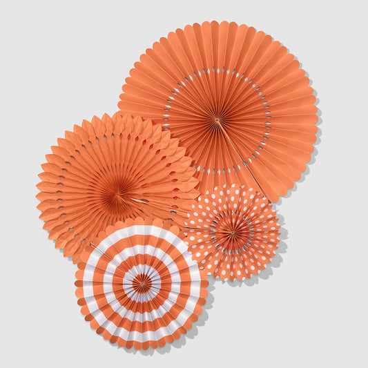 Coral orange fan party decorations.