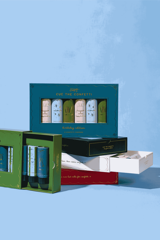 Collection of skincare product boxes on a blue background