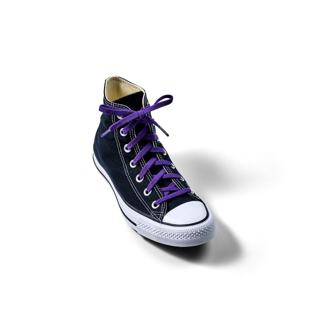 Cosmic purple elastic shoelaces threaded through a black high-top sneaker.