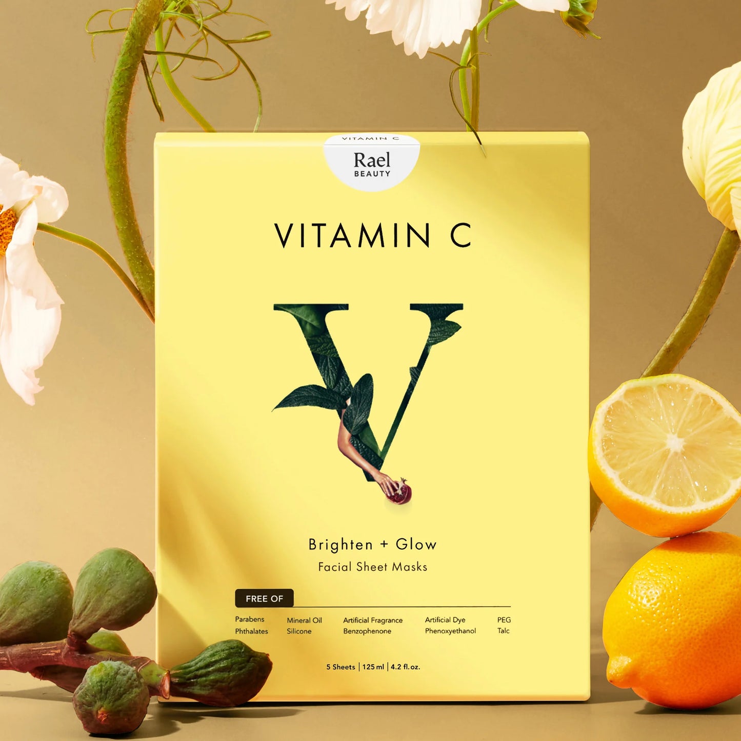 Vitamin C facial sheet masks packaging with lemons and flowers on a beige background