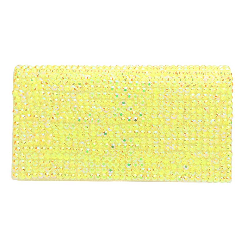 Yellow sponge with a textured surface on a white background