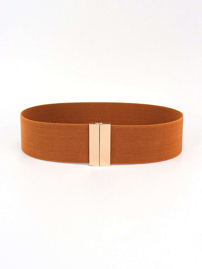 Wide tan elastic belt with a rectangular gold metal buckle, shown in a circular arrangement on a white background.