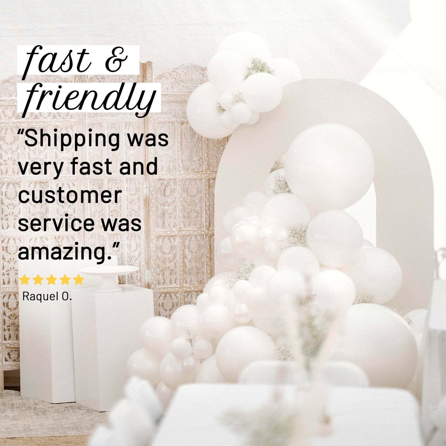 White balloon arch with positive customer review text overlay