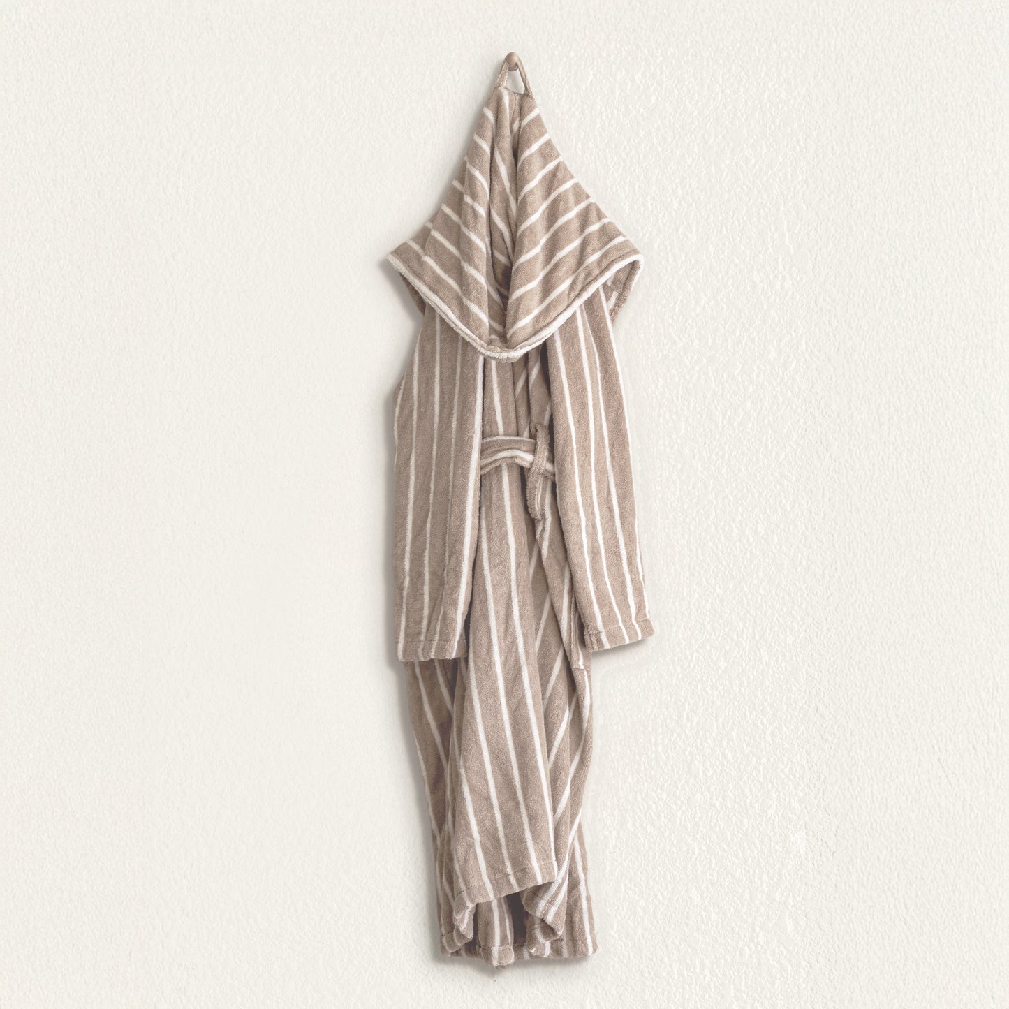 Striped robe with hood on a white background