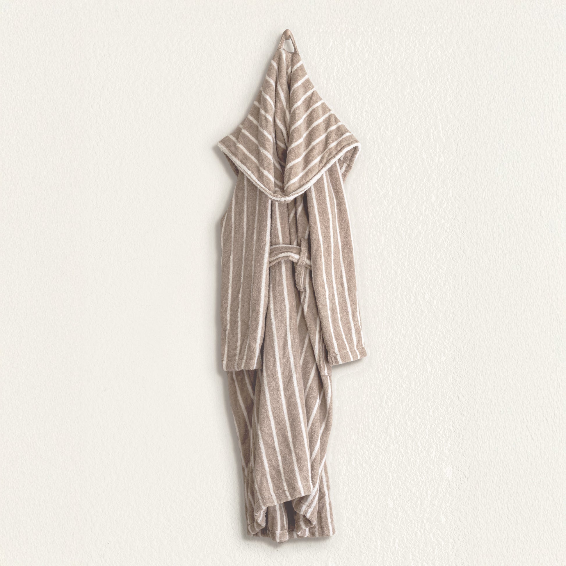 Striped robe with hood on a white background
