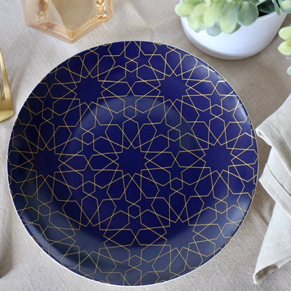 Blue plate with geometric pattern on a table setting