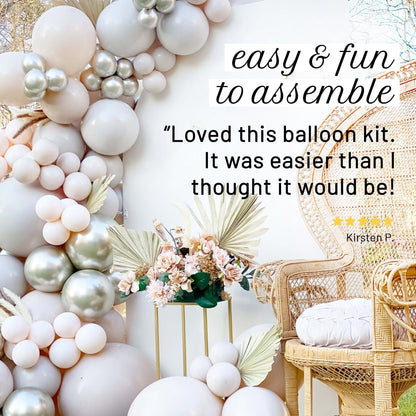 Balloon arch with decorative elements and a chair, featuring a five-star review.