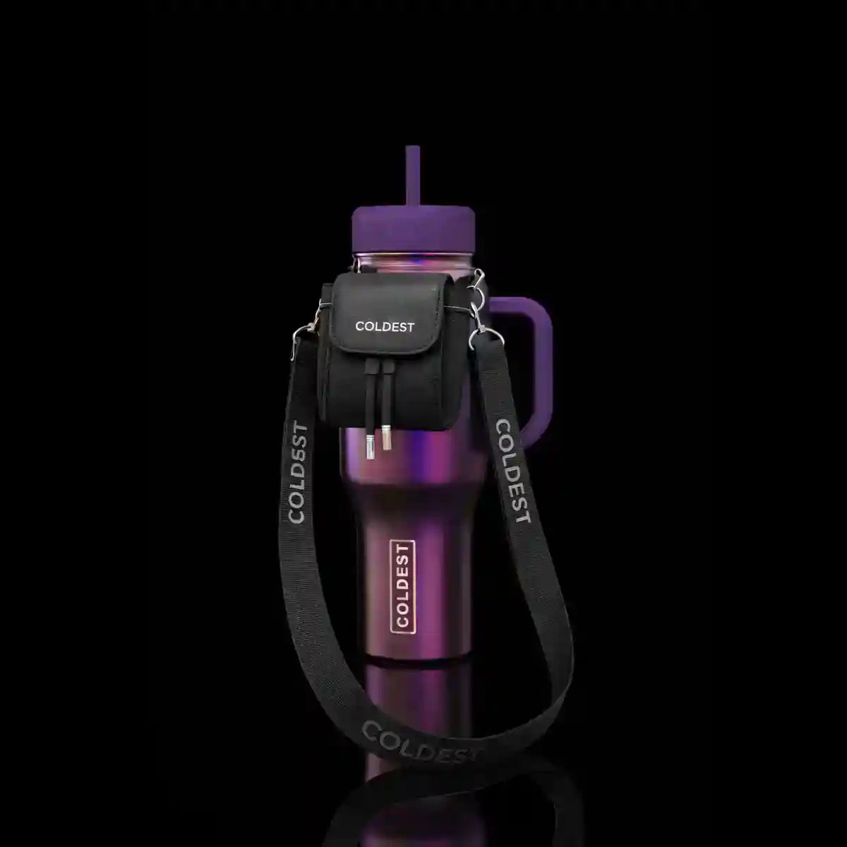 Coldest water bottle in purple with a mini backpack, squeeze holder, and key hanger on a black background.