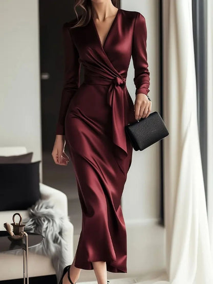 Front View: Satin tie waist long sleeve dress front view showing fluid fabric with ruched detailing and adjustable tie belt