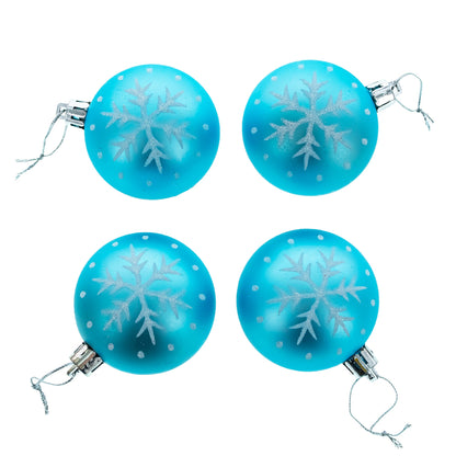 Four round blue plastic ornaments with silver snowflake patterns and hanging strings arranged in a square on white.