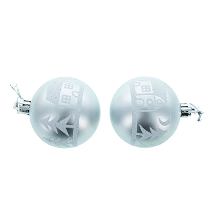 Two round silver plastic Christmas ornaments with white glitter house and tree designs on a white background.