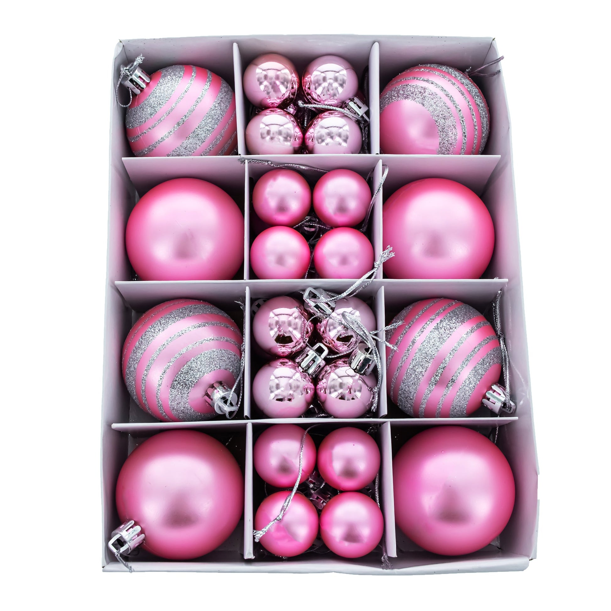 Forty pink plastic ball ornaments in matte, shiny, and silver glitter striped finishes arranged in a white grid box.