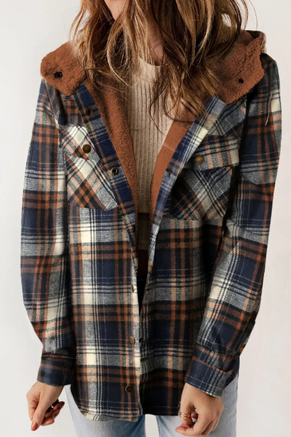 Plaid jacket with blue and brown hood and collar on a white background