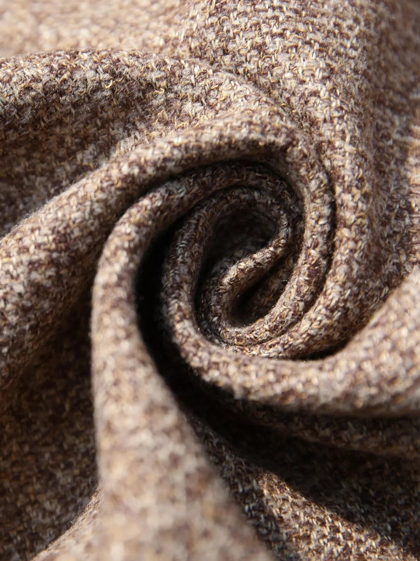 Close-up of brown fabric with a textured pattern
