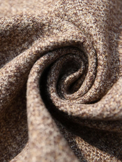 Close-up of brown fabric with a textured pattern