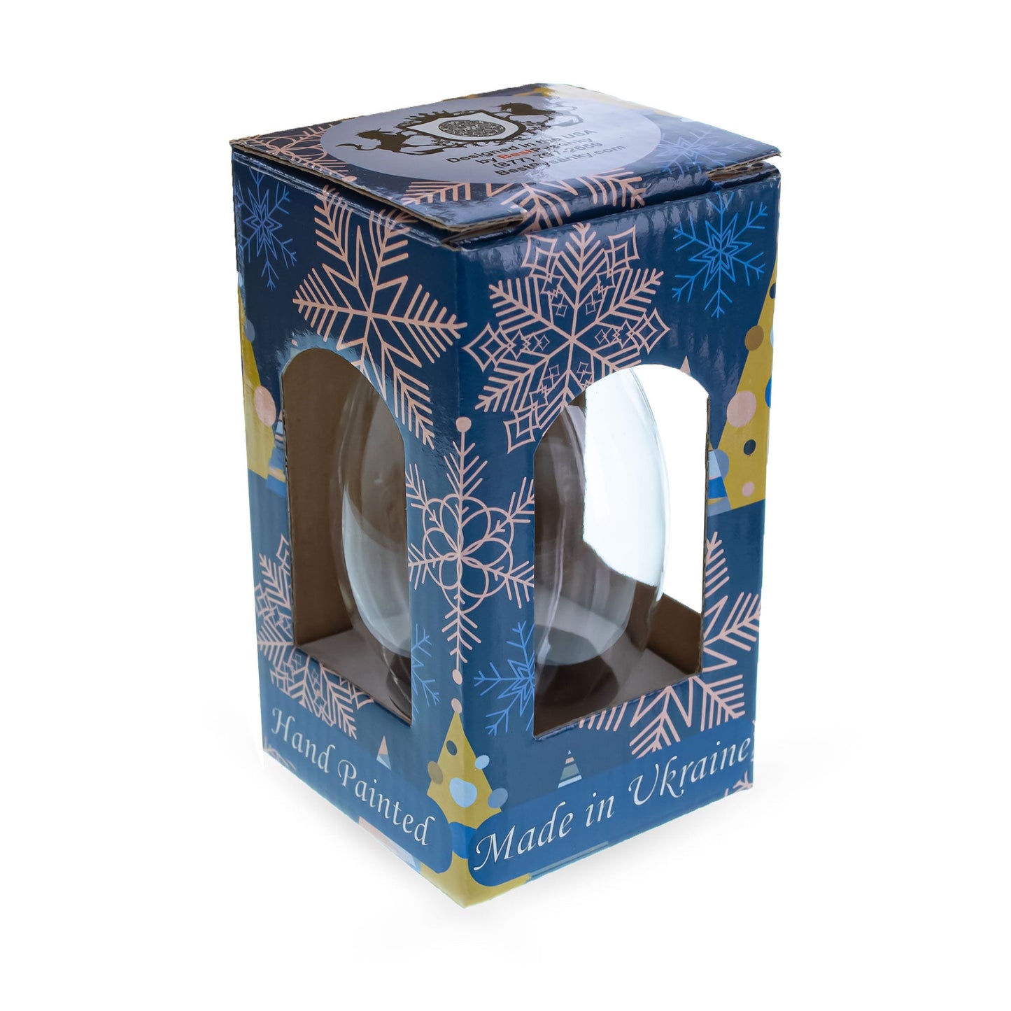 Clear glass egg ornament in a blue snowflake box printed with Hand Painted and Made in Ukraine.