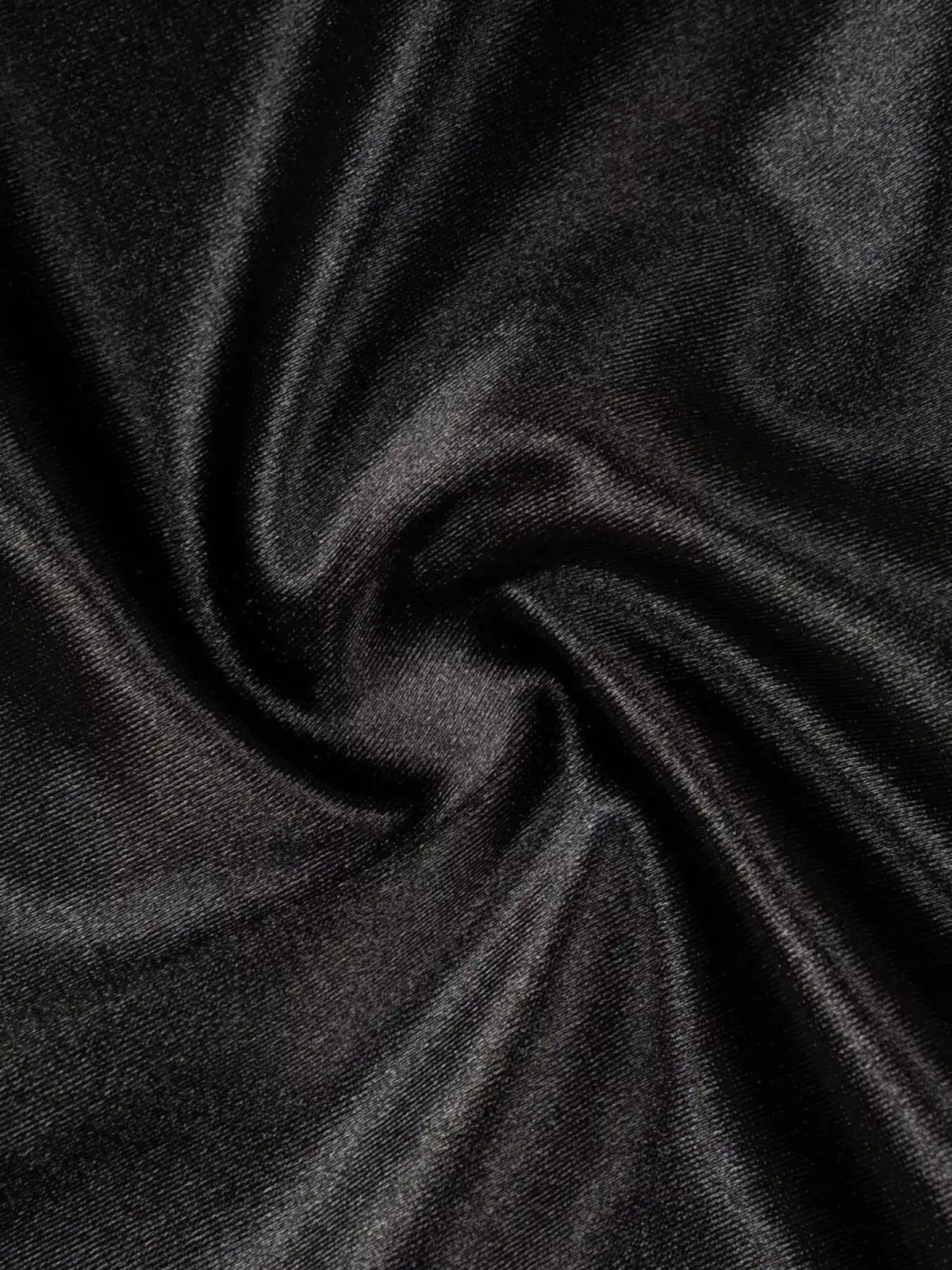 Close-up of dark gray fabric with folds