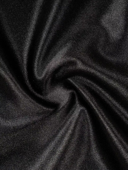 Close-up of dark gray fabric with folds