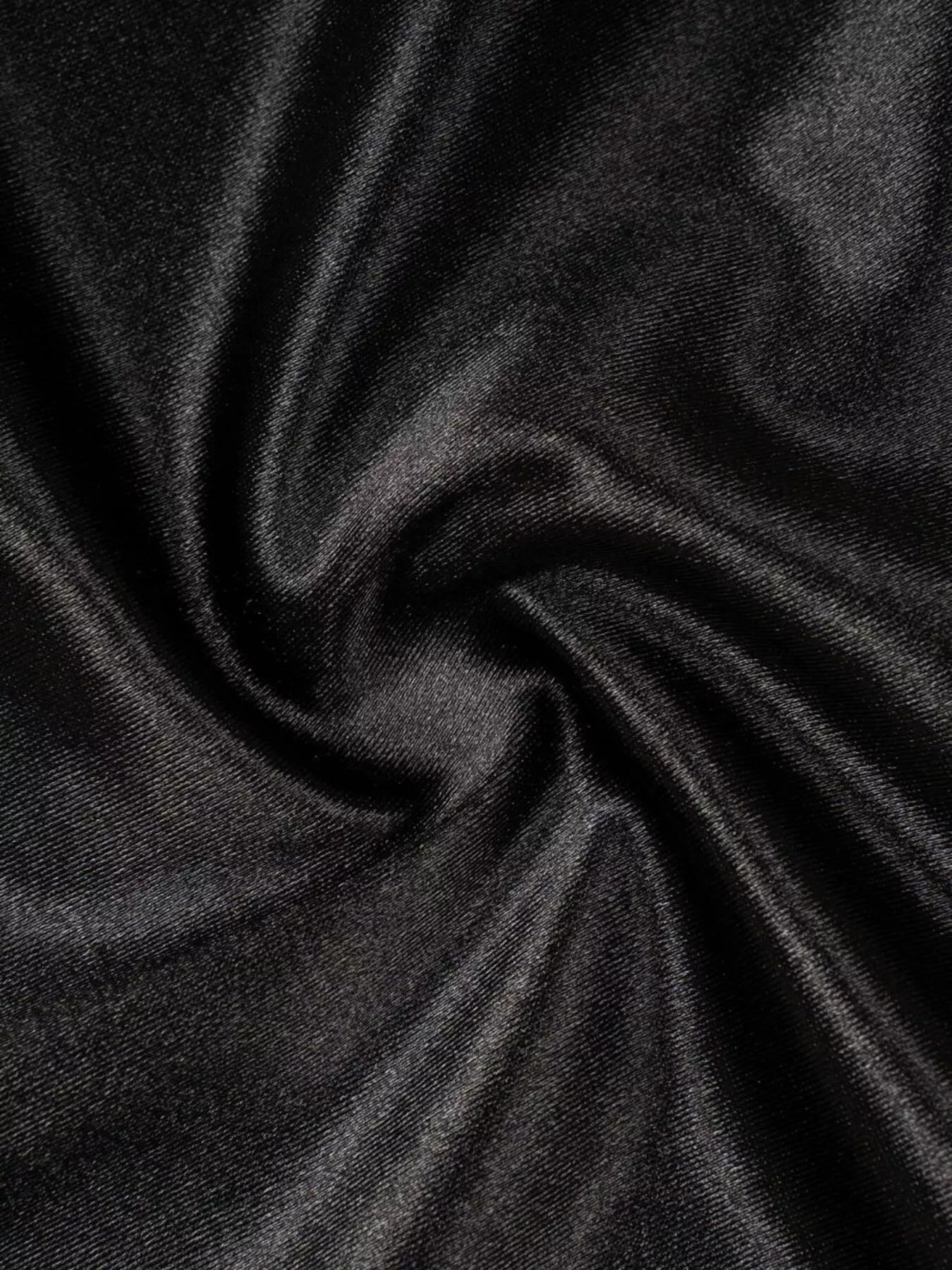 Close-up of dark gray fabric with folds