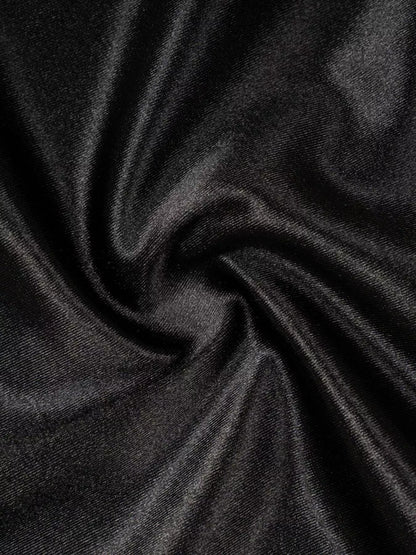 Close-up of dark gray fabric with folds