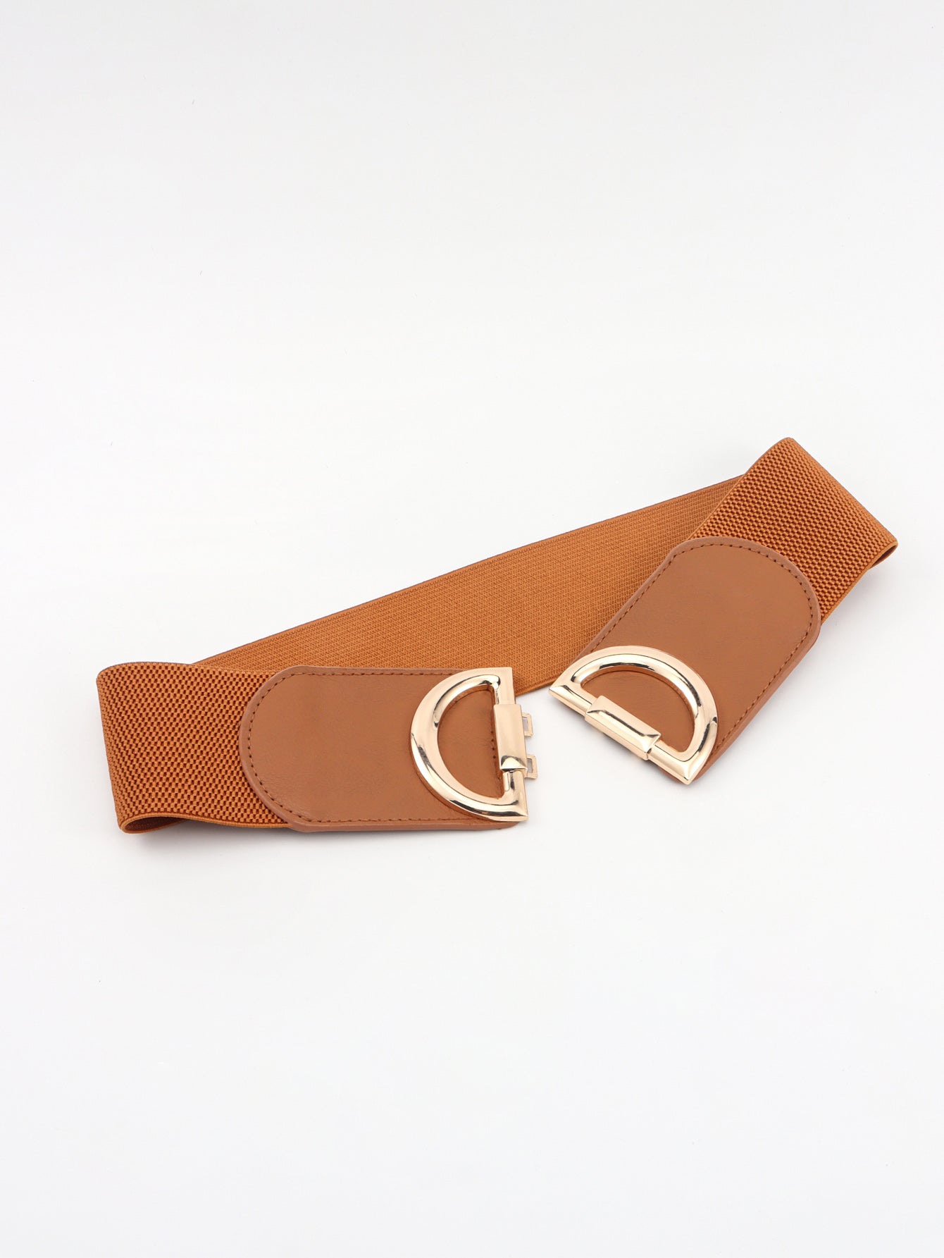 Brown belt with gold buckle on a white background