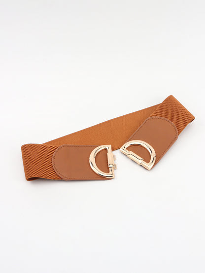Brown belt with gold buckle on a white background