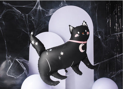 Black cat-shaped inflatable toy with star and moon designs on a dark background with spider webs.