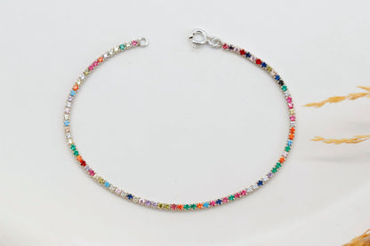 Colorful Dreams rainbow bracelet featuring multicolored stones set in a silver-tone chain.