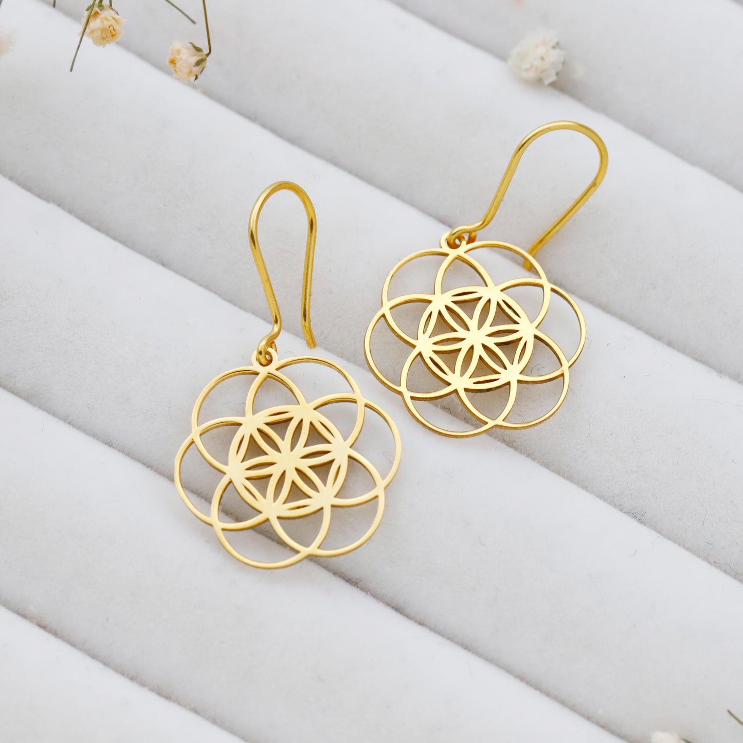 Dangle sacred geometry earrings in 925 sterling silver with intricate circular designs and a polished finish.