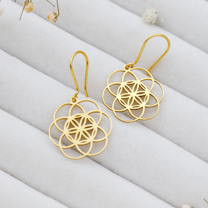 Dangle sacred geometry earrings in 925 sterling silver with intricate circular designs and a polished finish.