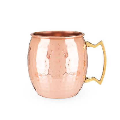 Hammered copper Moscow mule mug with a rounded body and gold-tone handle on a white background.