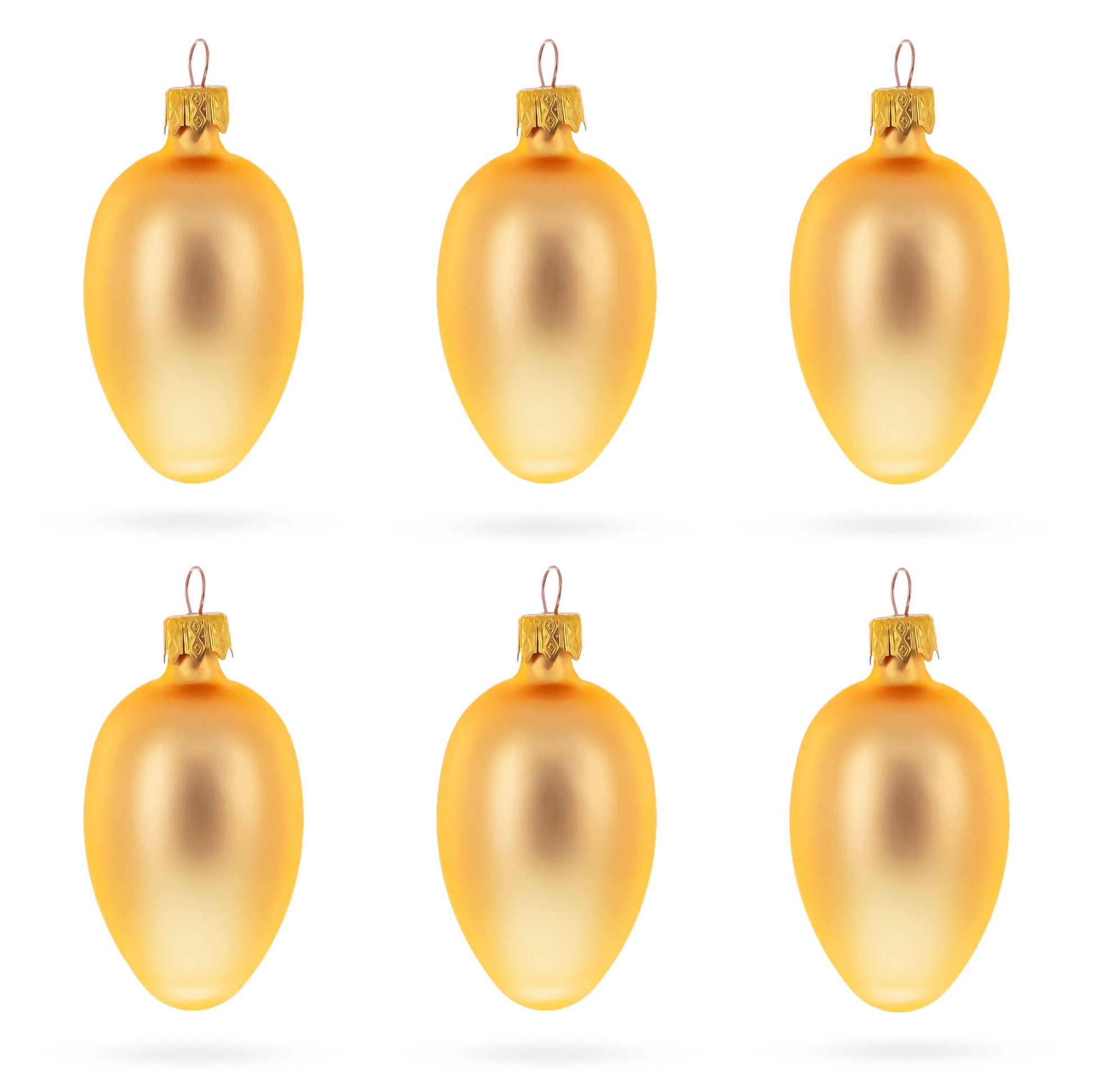 Six rose gold glass egg ornaments with metallic caps arranged in two rows on a white background.